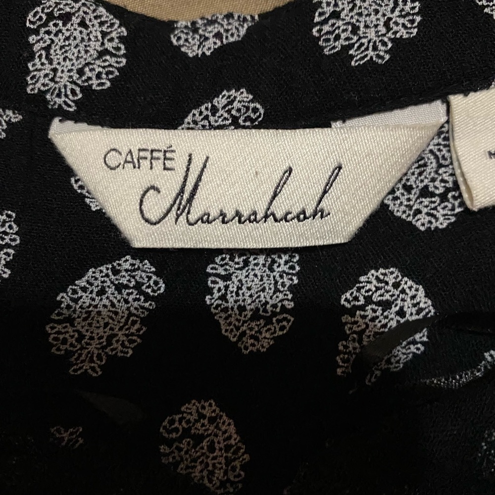 This is a really cute old styled shirt size medium